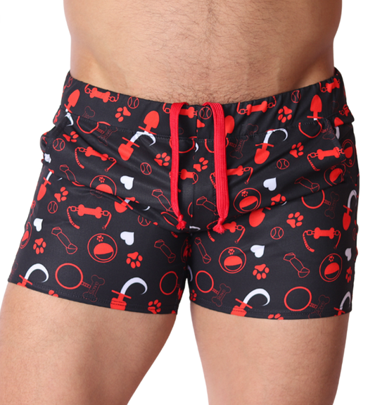 Front view of Gigo red and black dog-themed print athletic shorts with drawstring, elastic fabric.