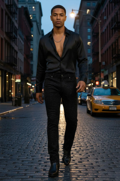 Black satin shirt with deep v-neckline and long sleeves paired with dolorosa rhinestone jeans front view