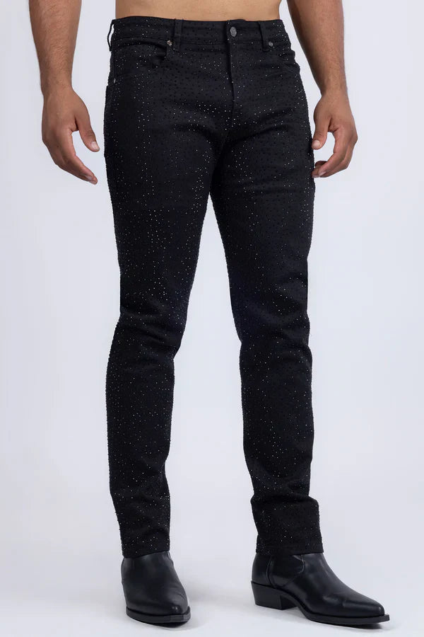 Dolorosa rhinestone jeans are black slim-fit denim with subtle glittery speckle pattern and classic construction