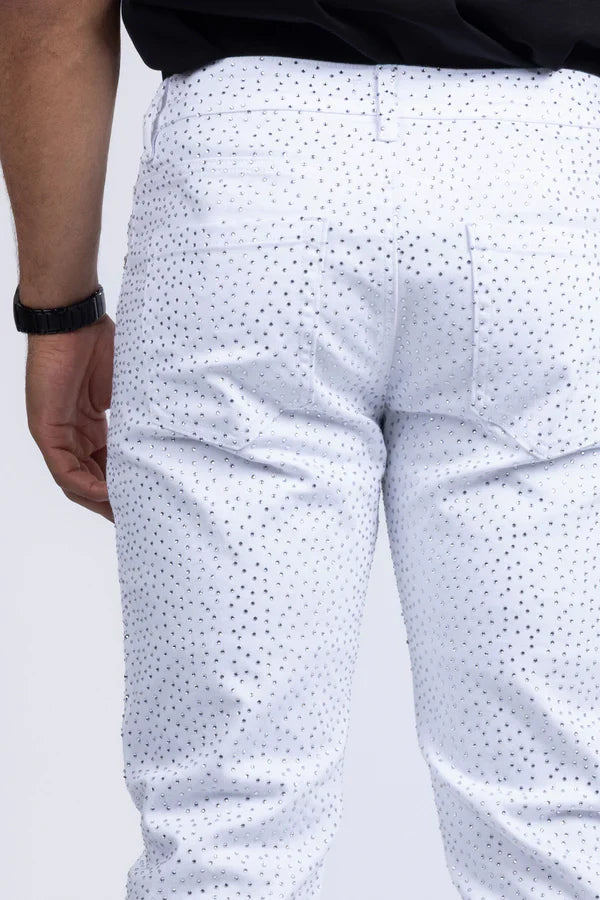 White dolorosa rhinestone jeans featuring subtle black dot pattern on lightweight denim fabric