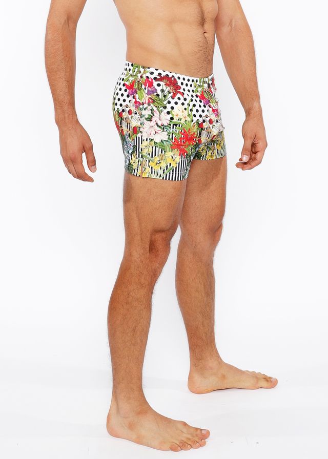 Dots abstract printed swim short featuring vibrant floral and polka dot patterns in bold colorful design
