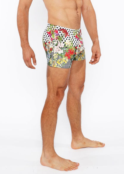 Dots abstract printed swim short featuring vibrant floral and polka dot patterns in bold colorful design