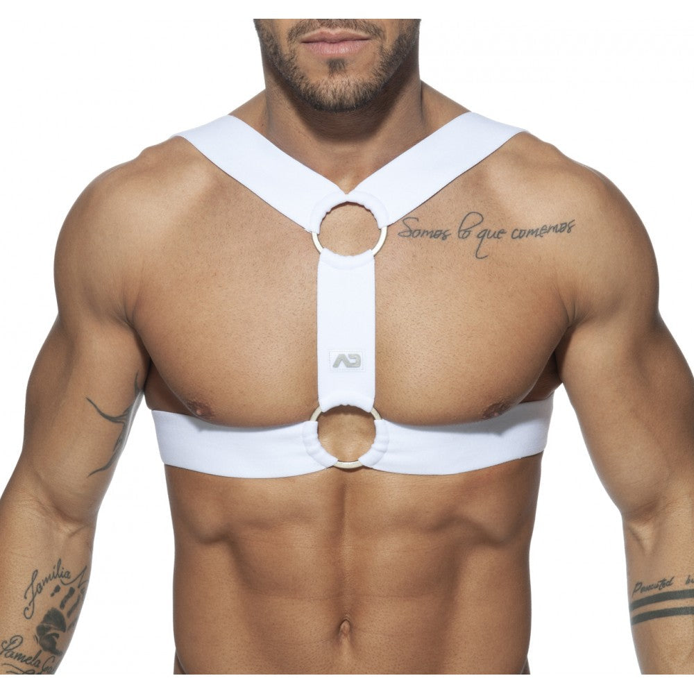 White fabric chest support double ring harness with adjustable straps and circular metal rings visible from the back side