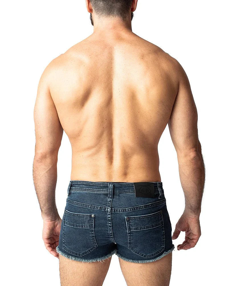 Dark blue denim duke shorts with frayed hem and back pockets shown from the back side