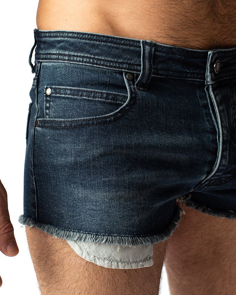 Dark blue denim duke short with frayed hem and visible stitching details for casual wear