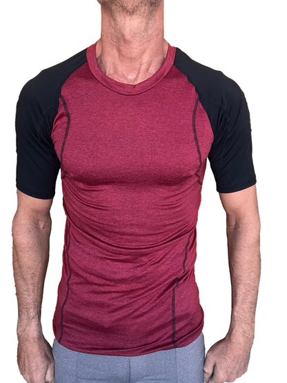 Designer raglan crew neck tee brick with black sleeve featuring maroon and black textured raglan athletic fabric