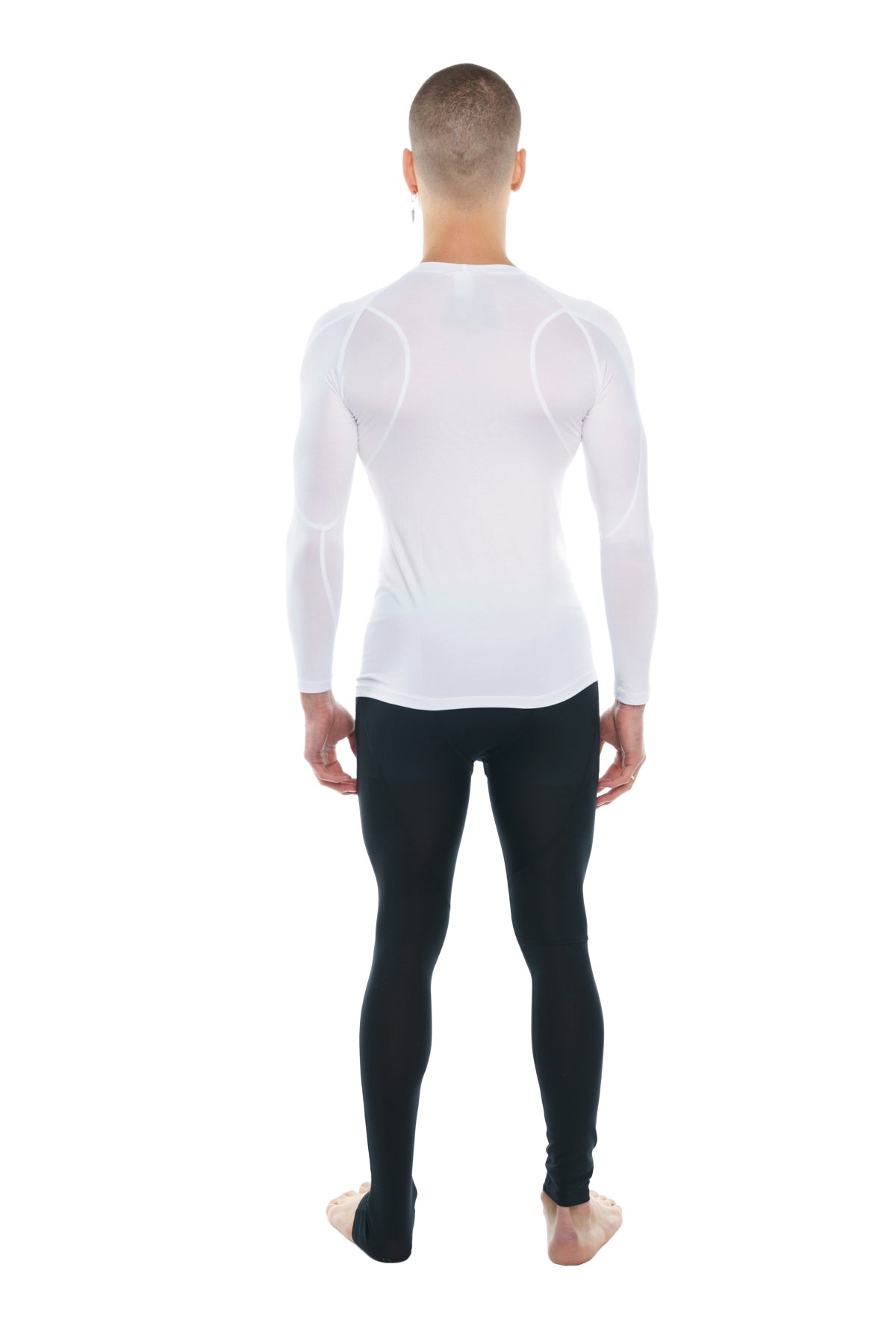 White long-sleeved designer raglan crew-neck compression shirt with subtle textured panels on shoulders and upper arms