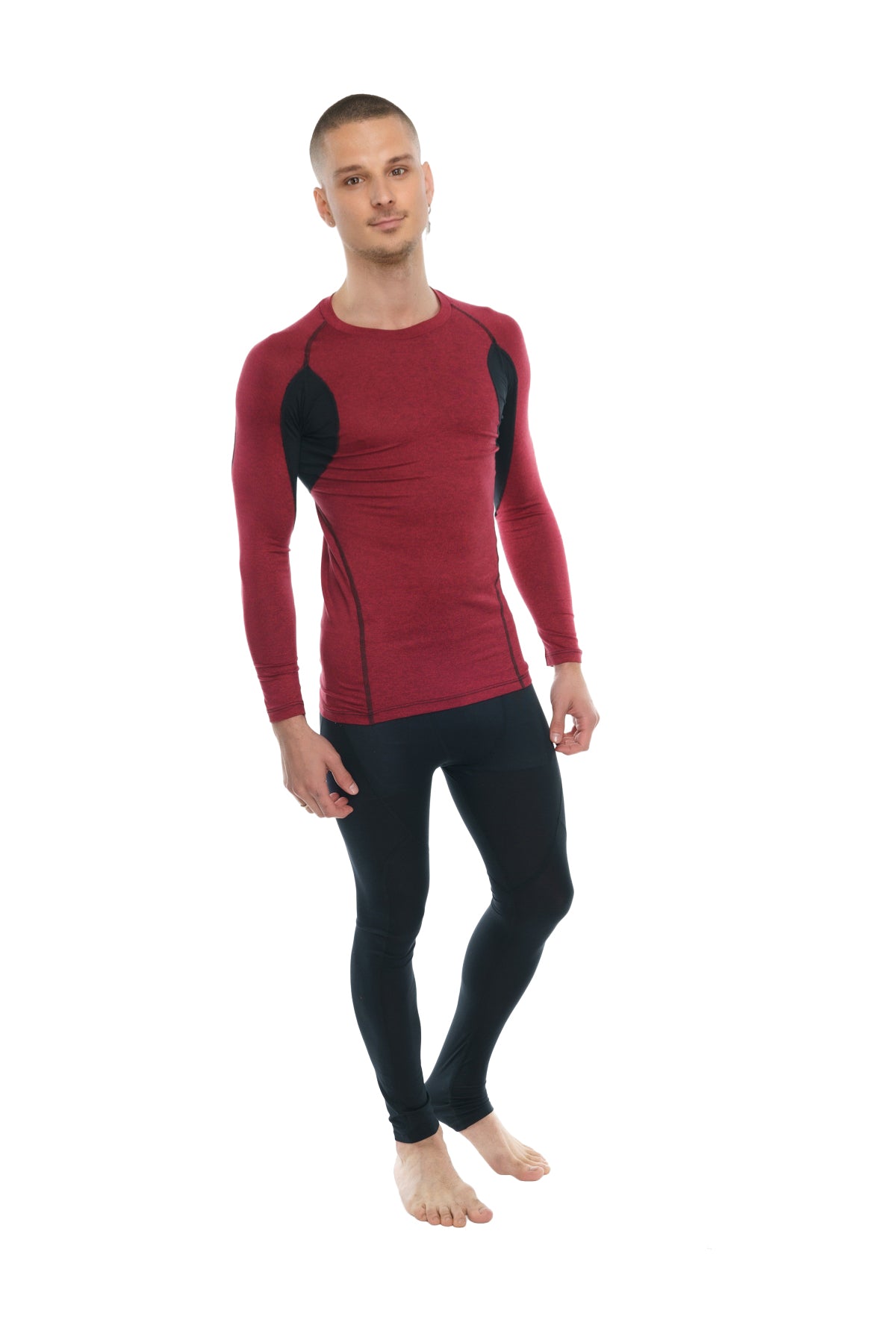 Red long-sleeved designer raglan crew-neck tee with black shoulder panels in a breathable athletic base layer fabric