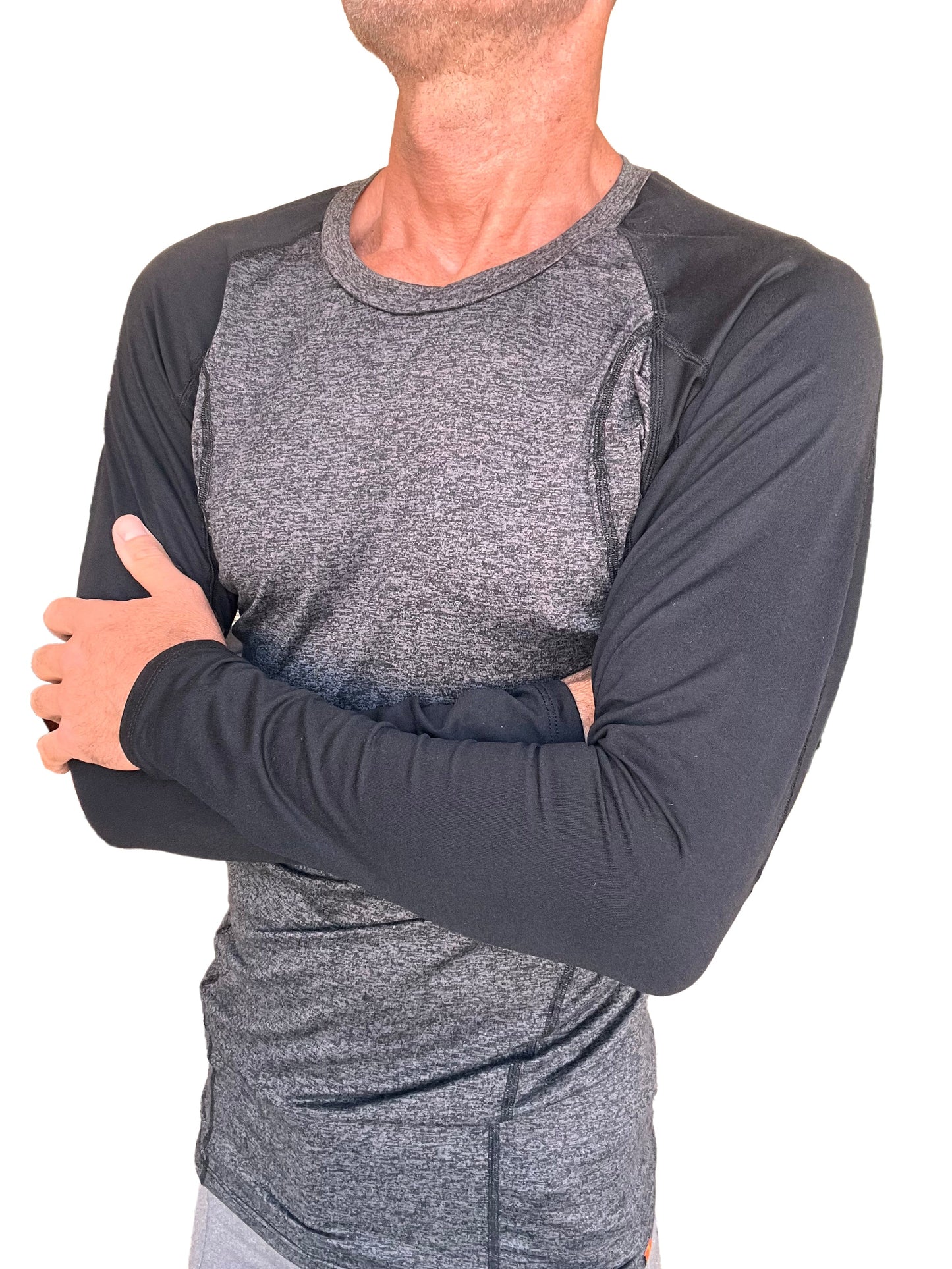 A men’s designer raglan long sleeve crew neck athletic shirt in charcoal heather gray with black sleeves