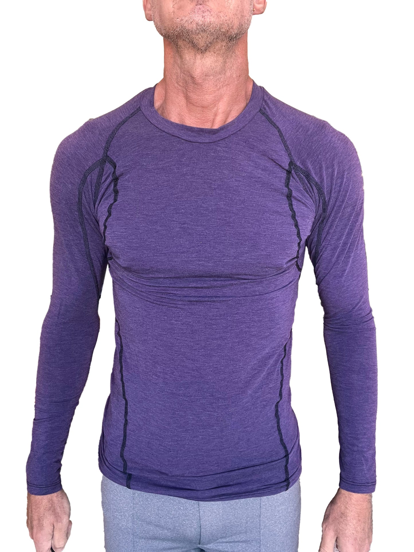 Purple long-sleeved designer raglan crew-neck tee with black seam detailing for athletic wear in eggplant purple