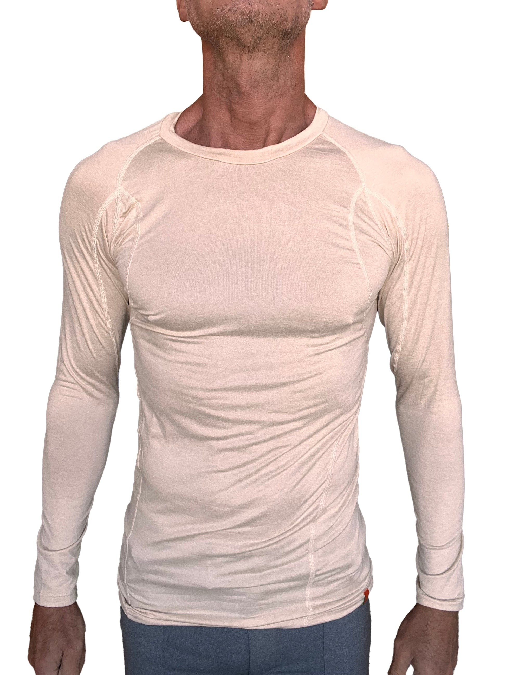Beige long-sleeved performance raglan crew-neck tee with subtle seam detailing for active wear