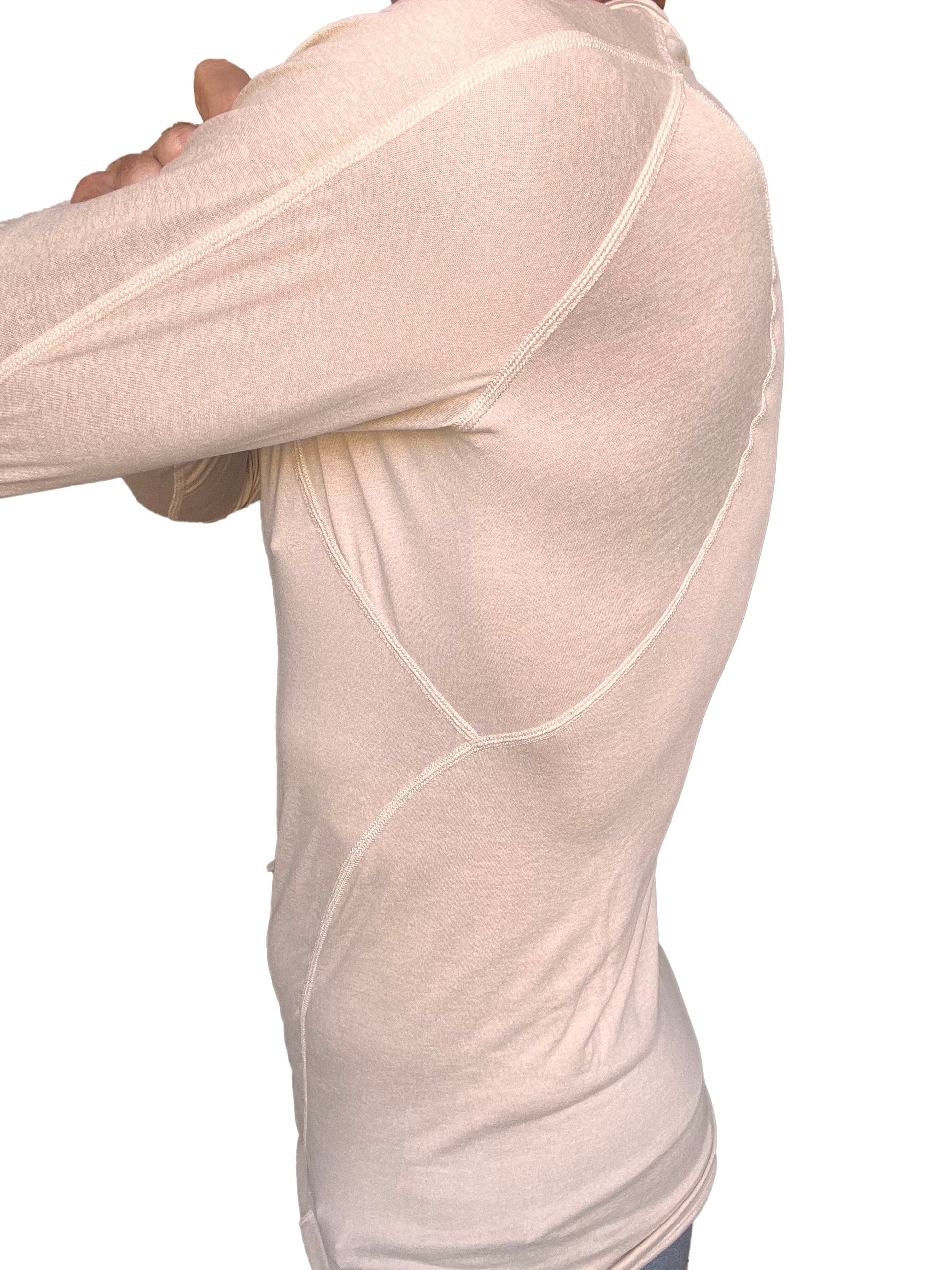 Beige long-sleeved designer raglan crew-neck compression shirt with visible seam detailing in sand beige color