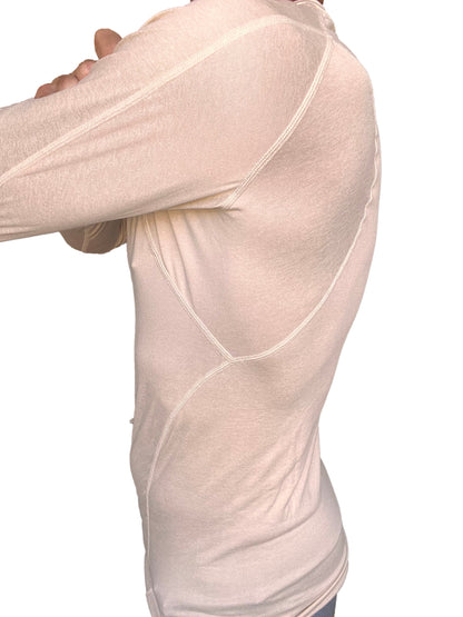 Beige long-sleeved designer raglan crew-neck compression shirt with visible seam detailing in sand beige color
