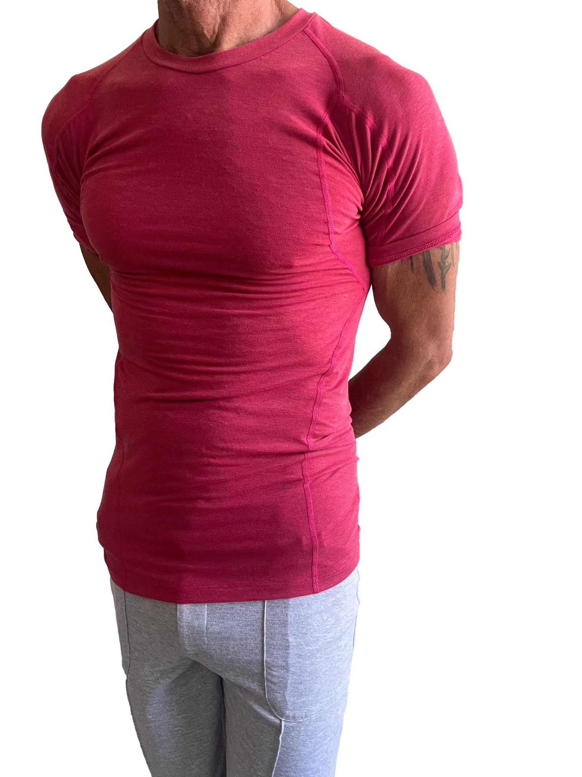 A form-fitting vibrant red designer raglan crew-neck tee with short sleeves and a comfortable athletic fit