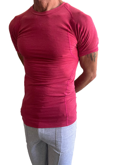 A form-fitting vibrant red designer raglan crew-neck tee with short sleeves and a comfortable athletic fit