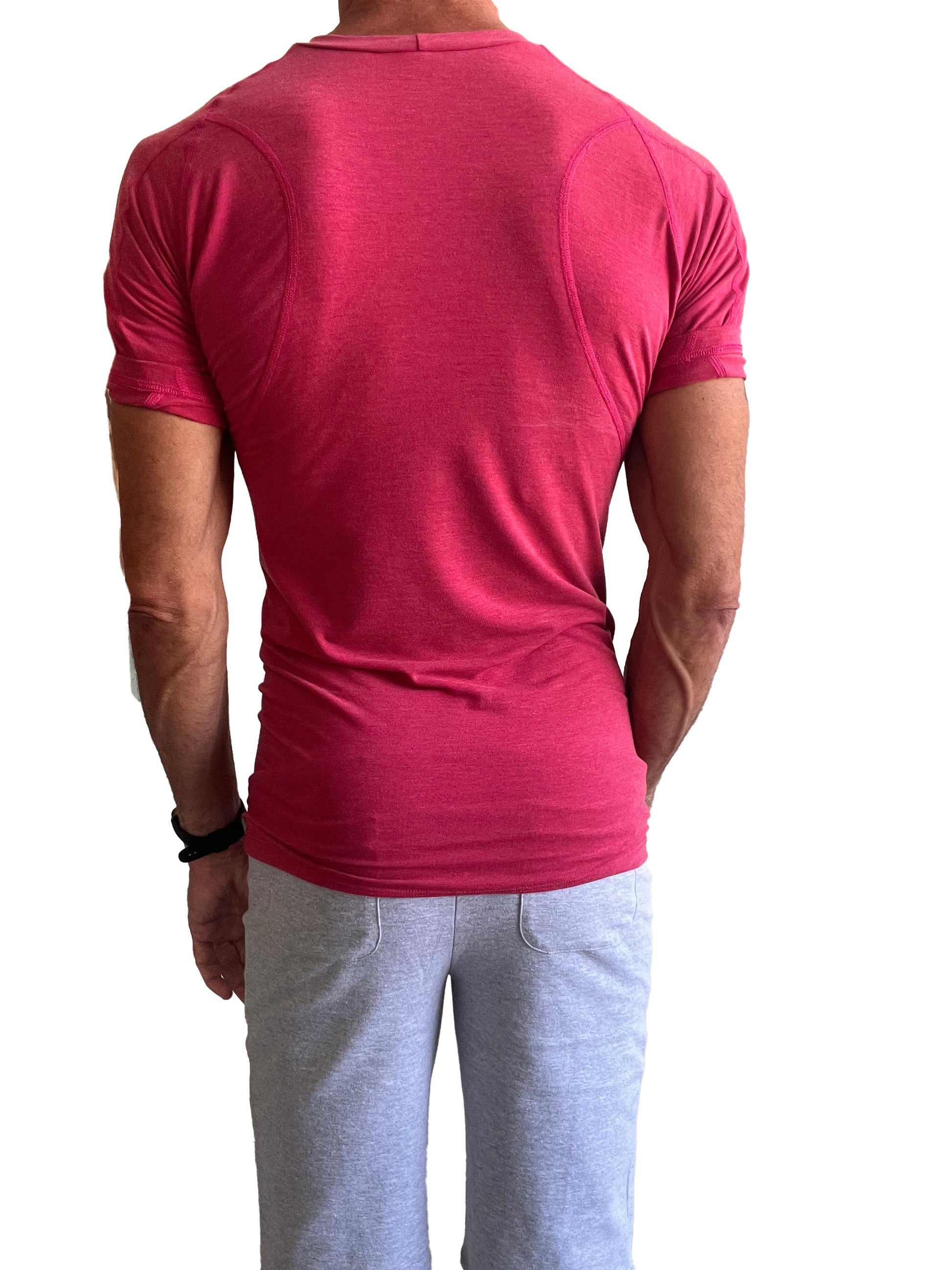 A vibrant raspberry designer raglan crew neck tee in fitted textured fabric with subtle seam detailing