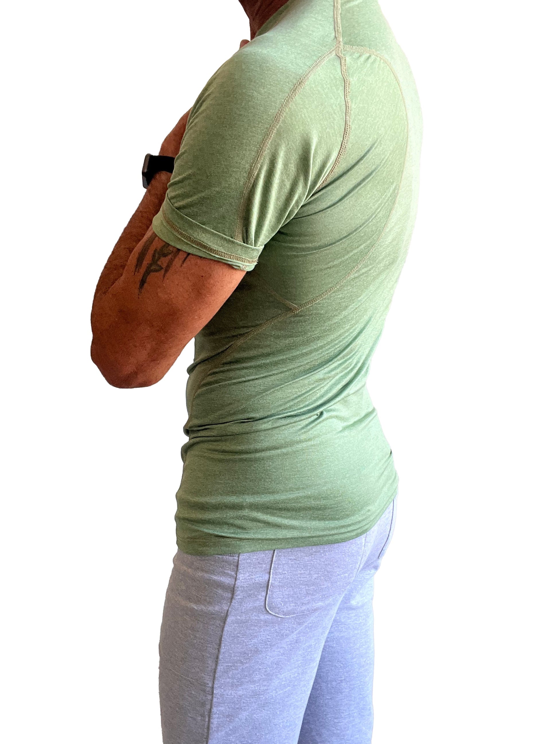 A light green fitted short-sleeved designer raglan crew-neck tee with subtle seam detailing