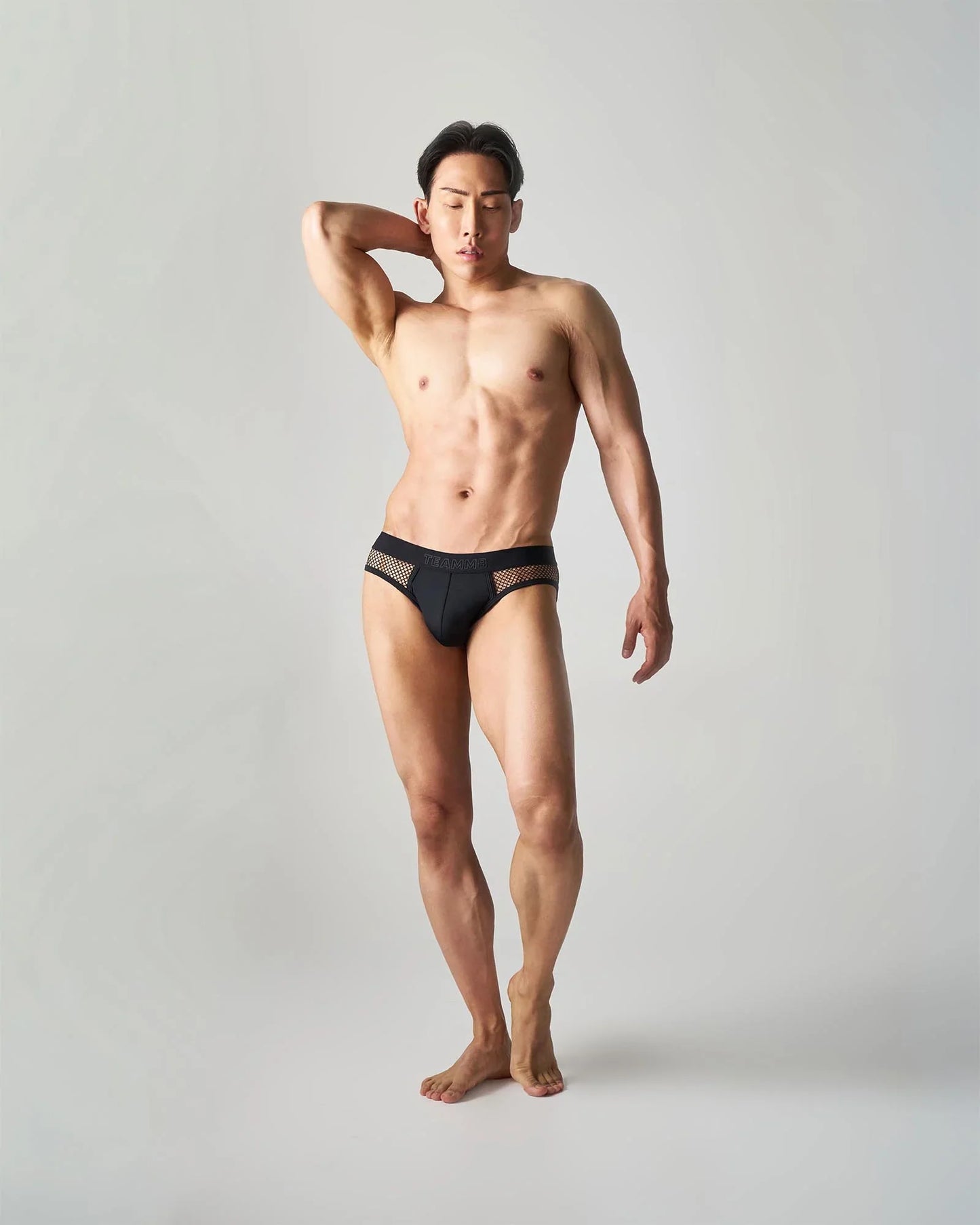 Black edge net brief with mesh panels on the sides for breathability and comfort