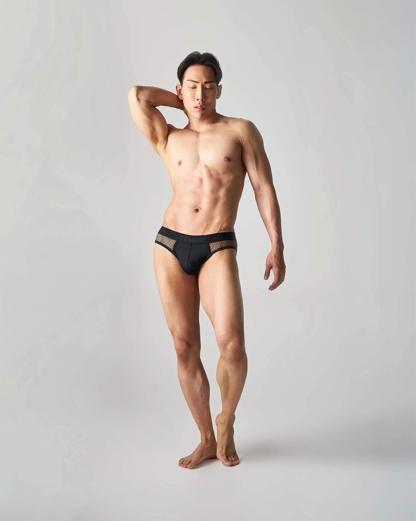 Black edge net brief with mesh panels on the sides for breathability and comfort