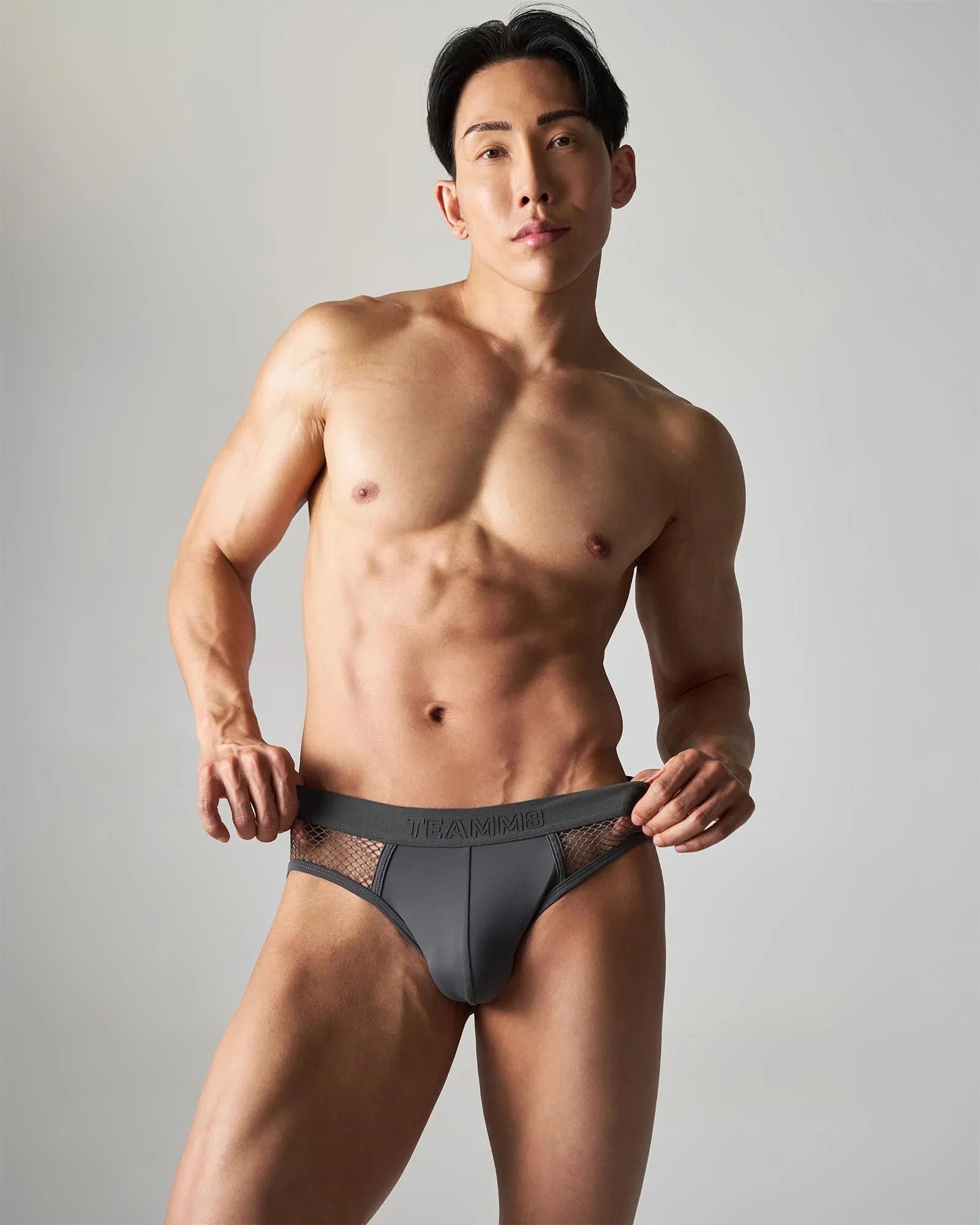 Dark gray calvin klein edge net briefs with mesh side panels for breathable comfort and style