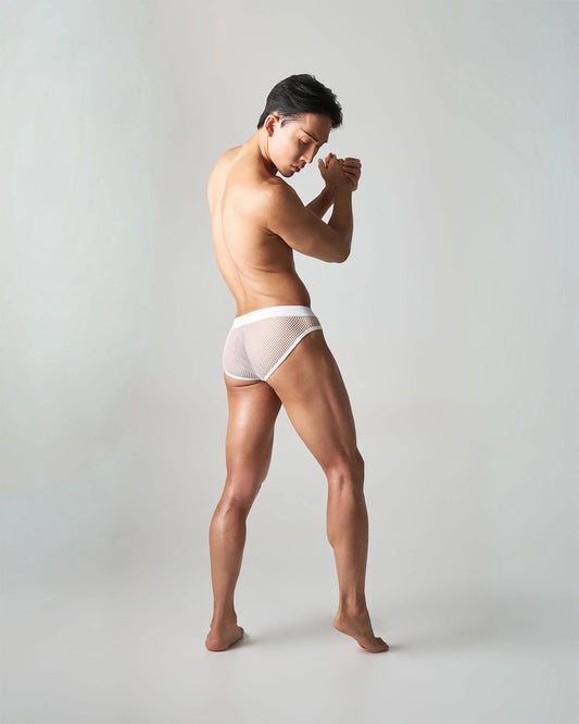 White mesh edge net brief with solid white waistband designed for breathable comfort and style