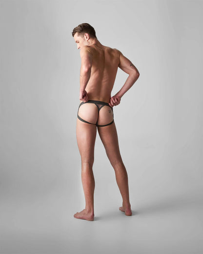 Black lace thong edged net jock with a supportive contoured design shown from the back side