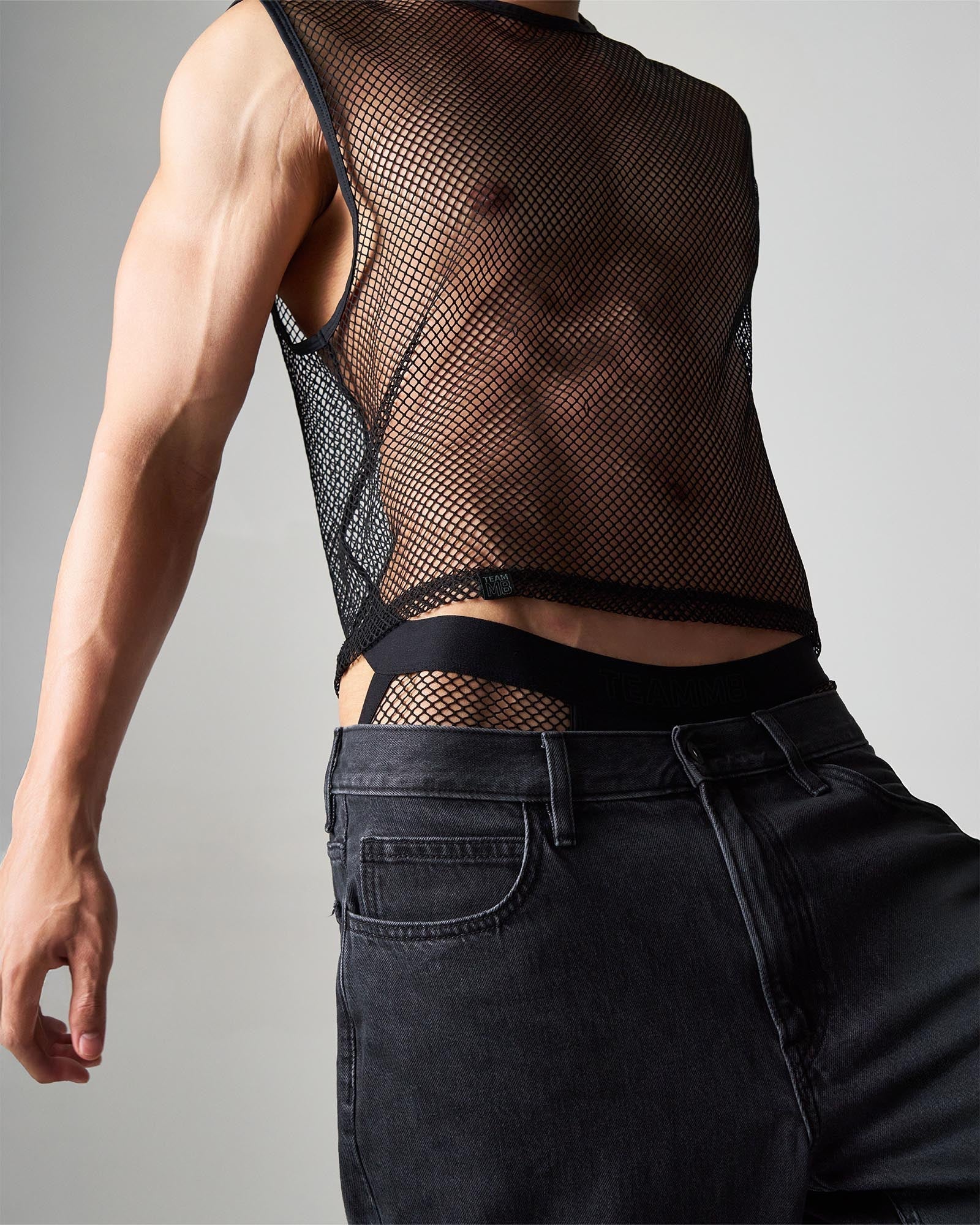 Black mesh sleeveless edge net mesh muscle tank with fitted cropped design made of breathable mesh material