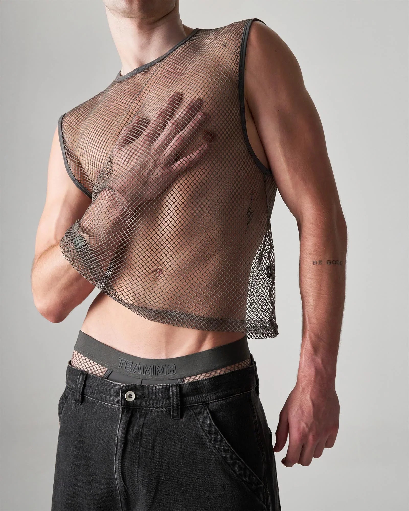 Edge Net mesh muscle tank dark gray fitted cropped design with reinforced shoulder seams in breathable mesh fabric