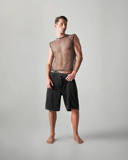 Black denim shorts with straight-leg cut and button closure paired with edge net mesh muscle tank