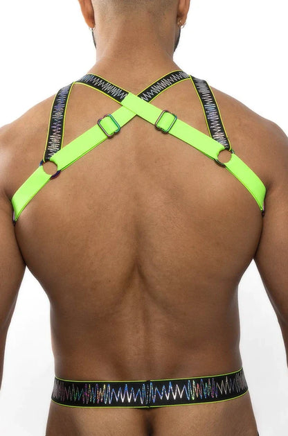Electro holographic harness featuring neon green harness with black patterned straps and metallic buckles