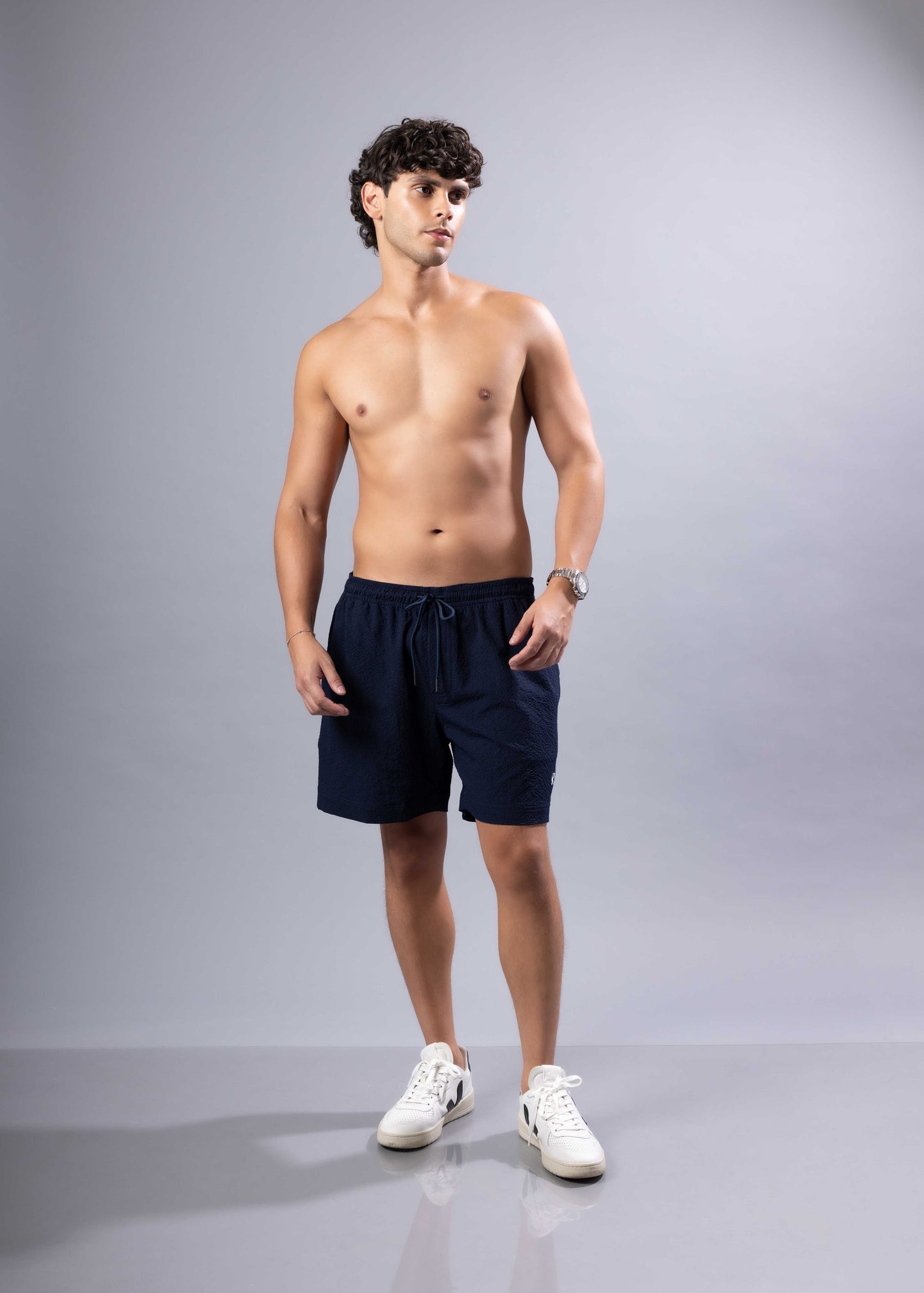 Navy blue essential swim short with drawstring closure made for comfortable swimming and beachwear available in 3 colors