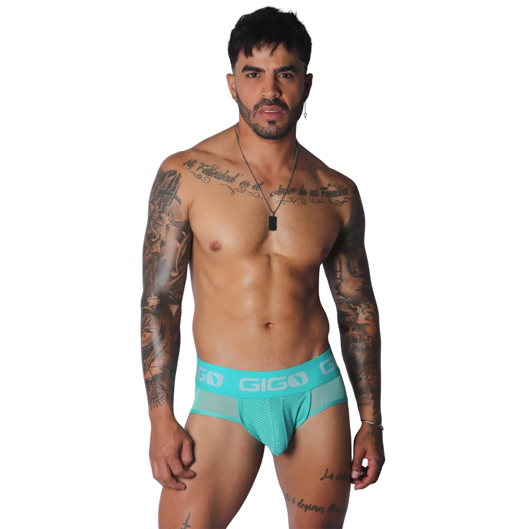 Aqua jock thong with mesh fabric, supportive pouch, and wide, branded elastic waistband with white logo lettering.