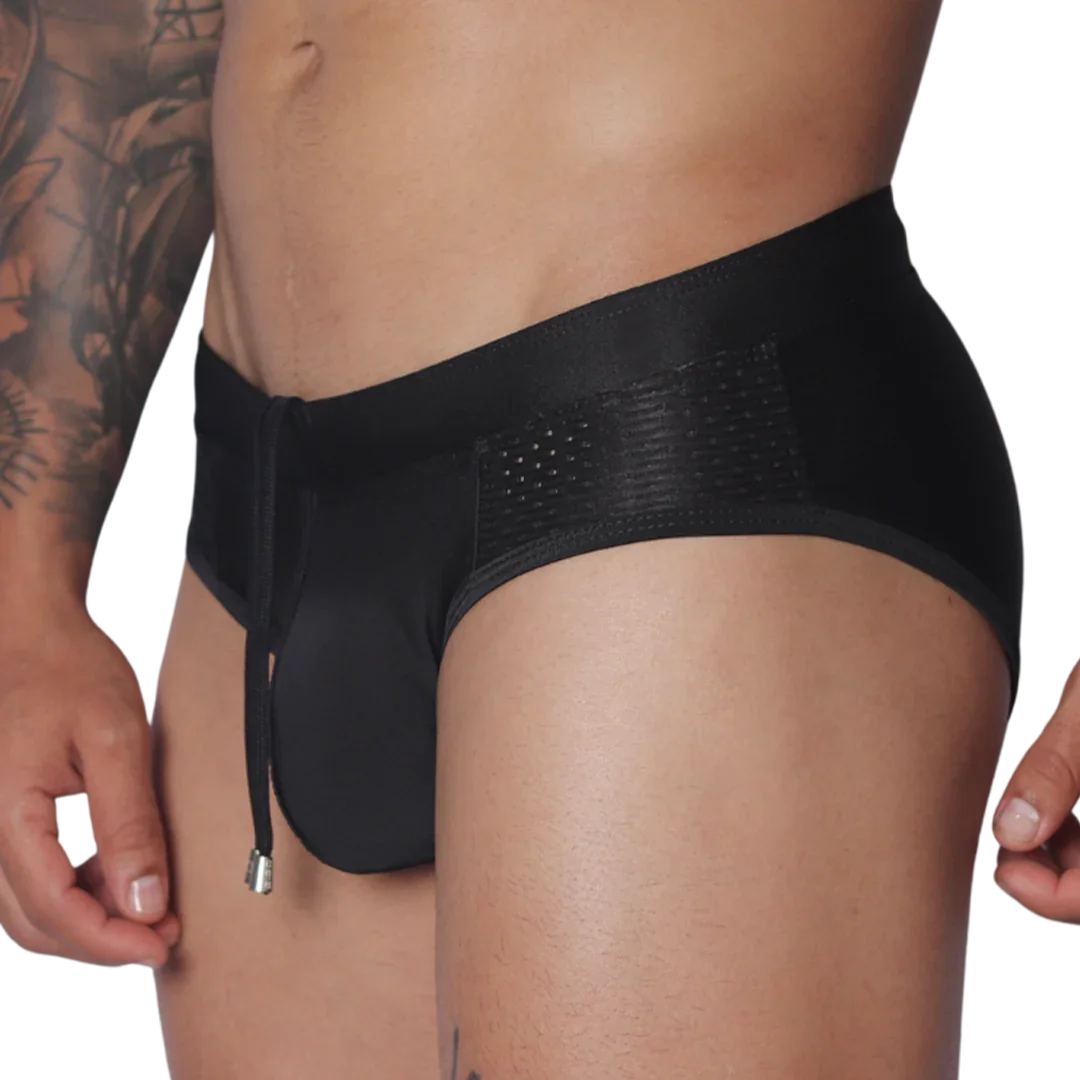 Black swim brief with side mesh panels, a drawstring waist, and metallic tips.