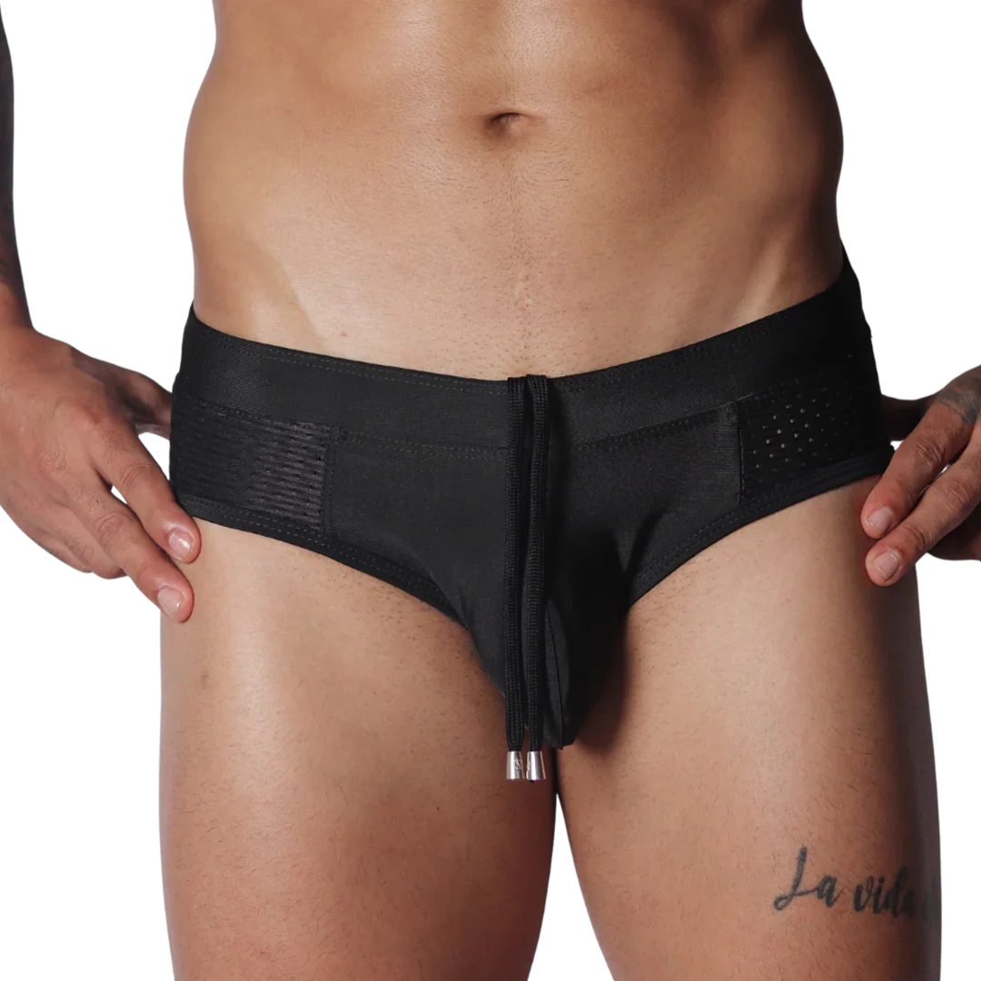 Black low-rise swim brief with side mesh panels and a center drawstring featuring metal-tipped aglets.