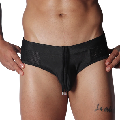 Black low-rise swim brief with side mesh panels and a center drawstring featuring metal-tipped aglets.