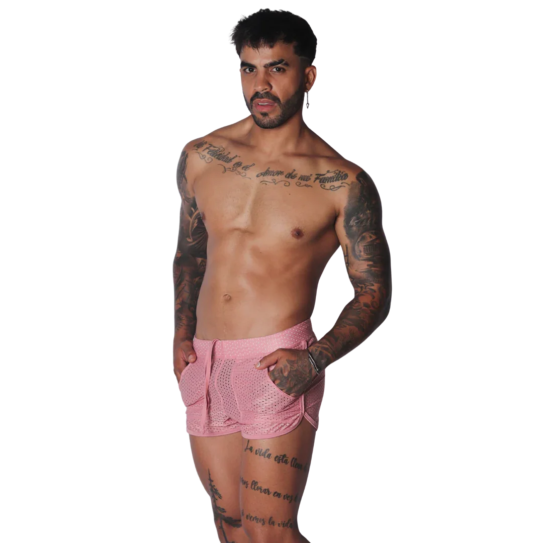 Pink, short-length athletic mesh shorts with a drawstring waist, side pockets, and rounded hem.