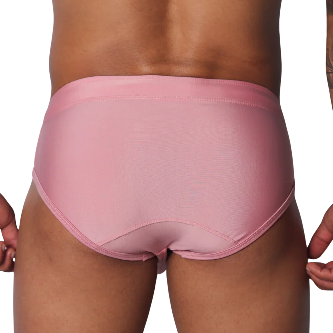 Solid pink athletic swim briefs featuring a classic brief cut with stitched panels and a supportive waistband.