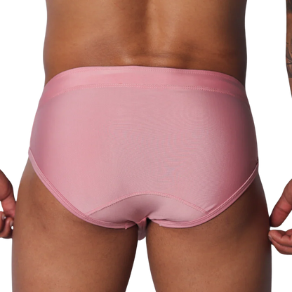 Solid pink athletic swim briefs featuring a classic brief cut with stitched panels and a supportive waistband.