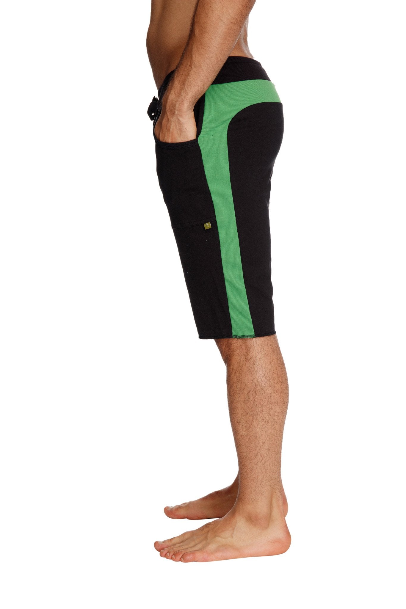 Eco-track short boardshorts in black with bamboo green bold vertical stripe made from sustainable materials