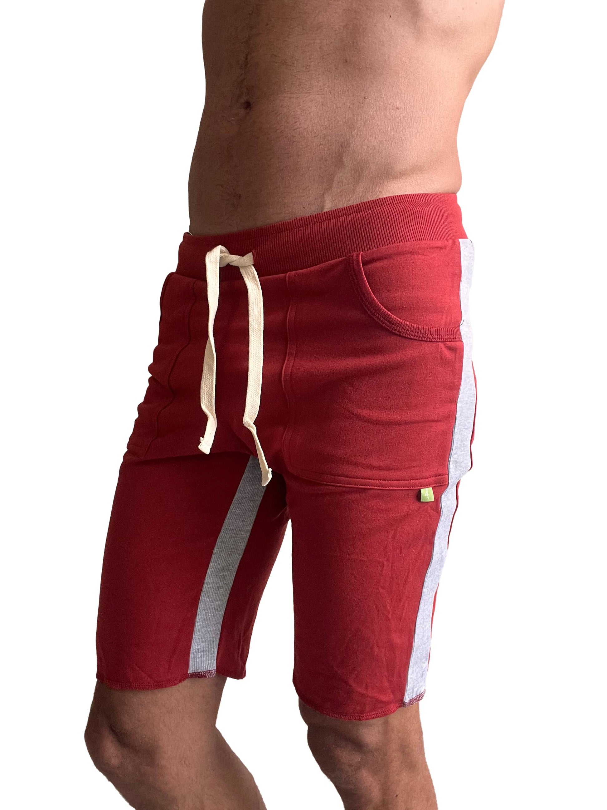 Eco-track short cinnabar with grey side stripes features red athletic shorts with a drawstring waistband