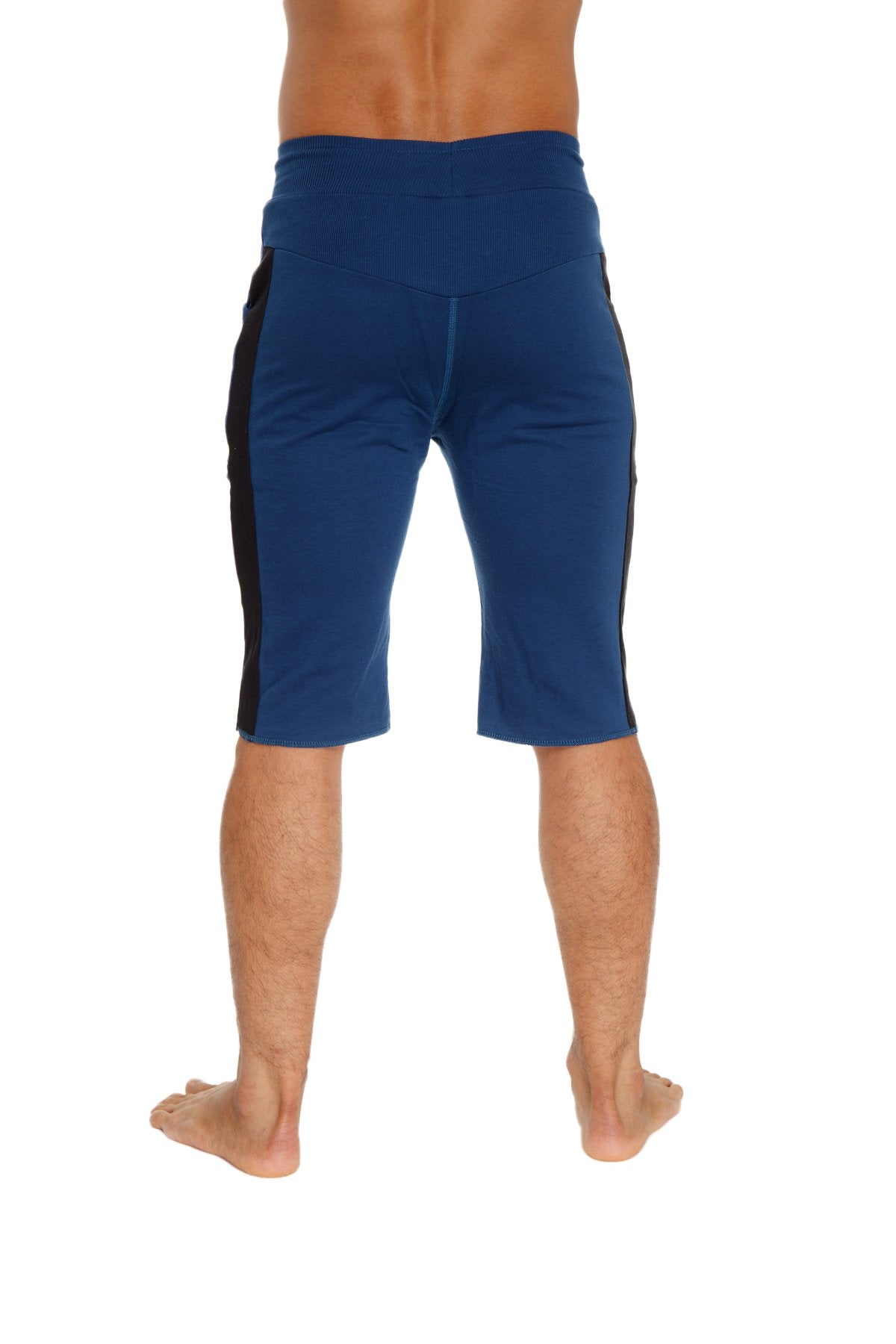 Eco-track short royal blue athletic shorts with black side panels made from eco-friendly material for training use