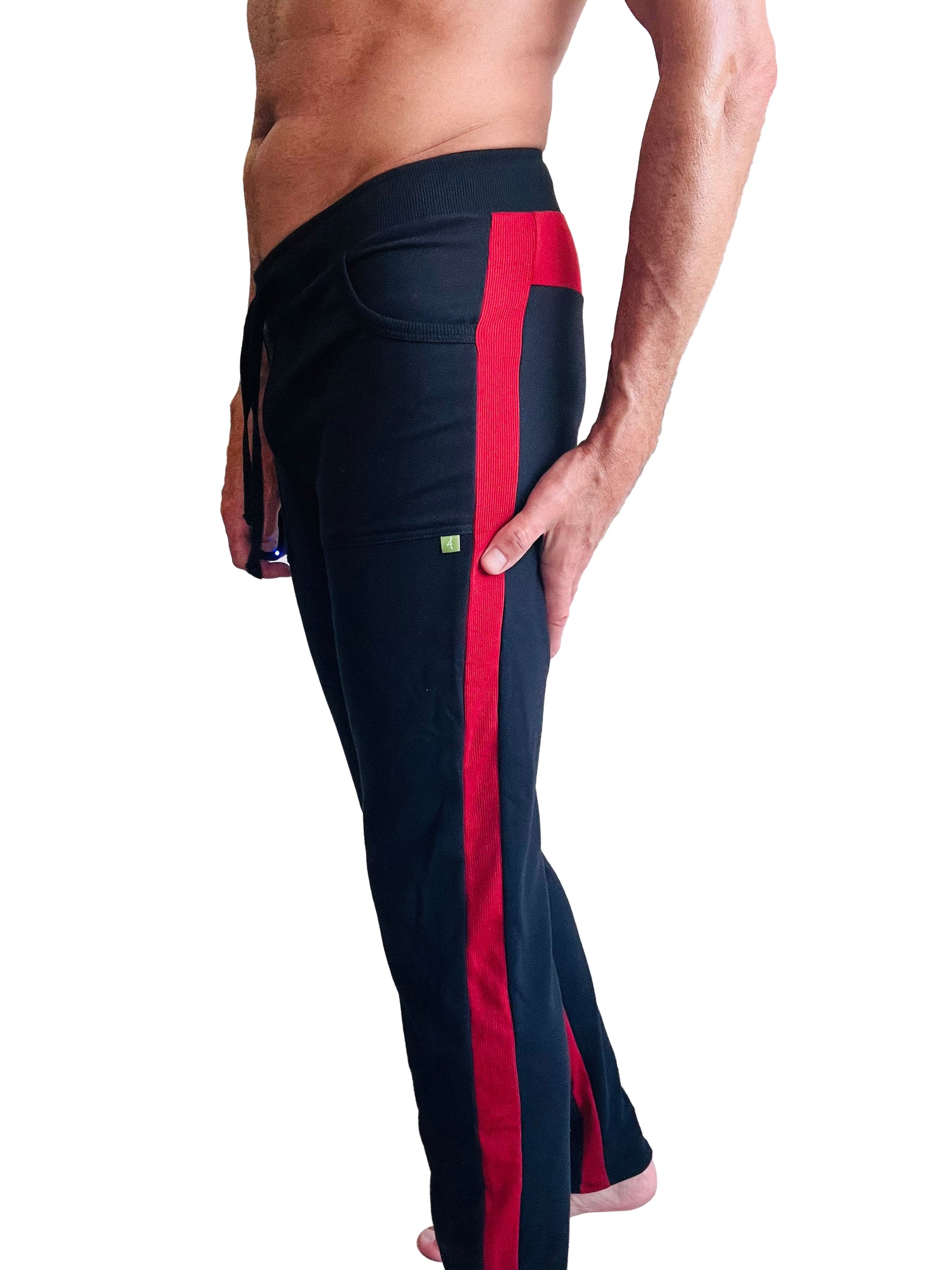 Black eco-track and yoga sweat pant with bold red side stripe drawstring waist and green thigh logo