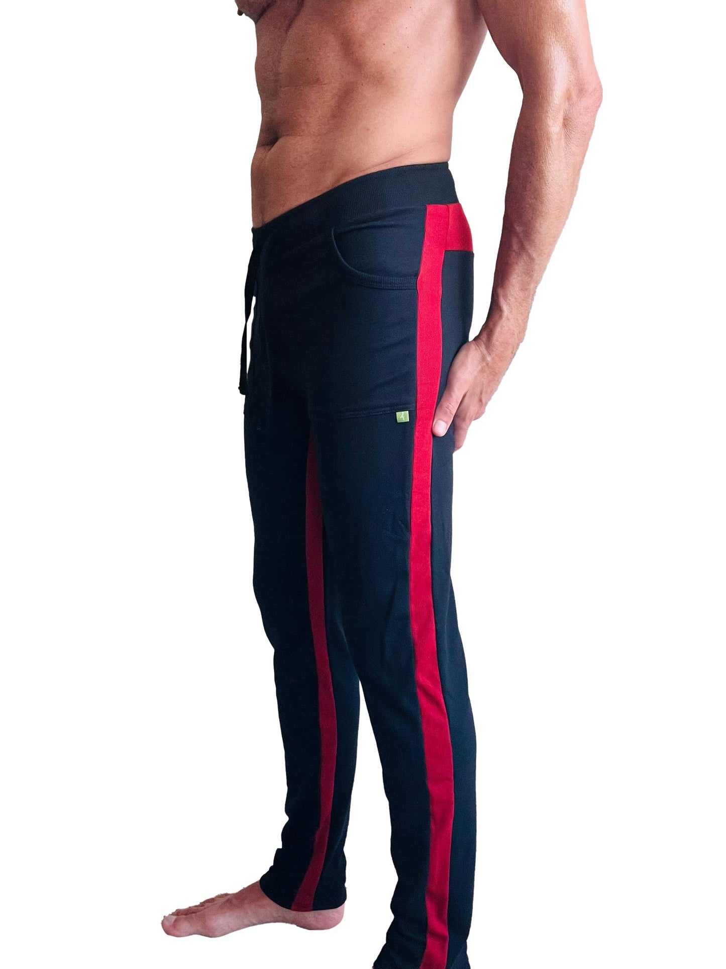 Black eco-track and yoga sweat pant with bold cinnabar side stripes and drawstring waistband for comfortable wear