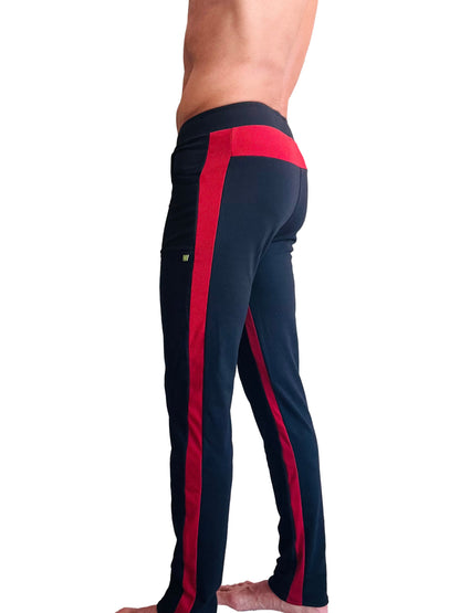 Black eco-track and yoga sweat pant with bold cinnabar red side stripes and matching waistband for athletic wear