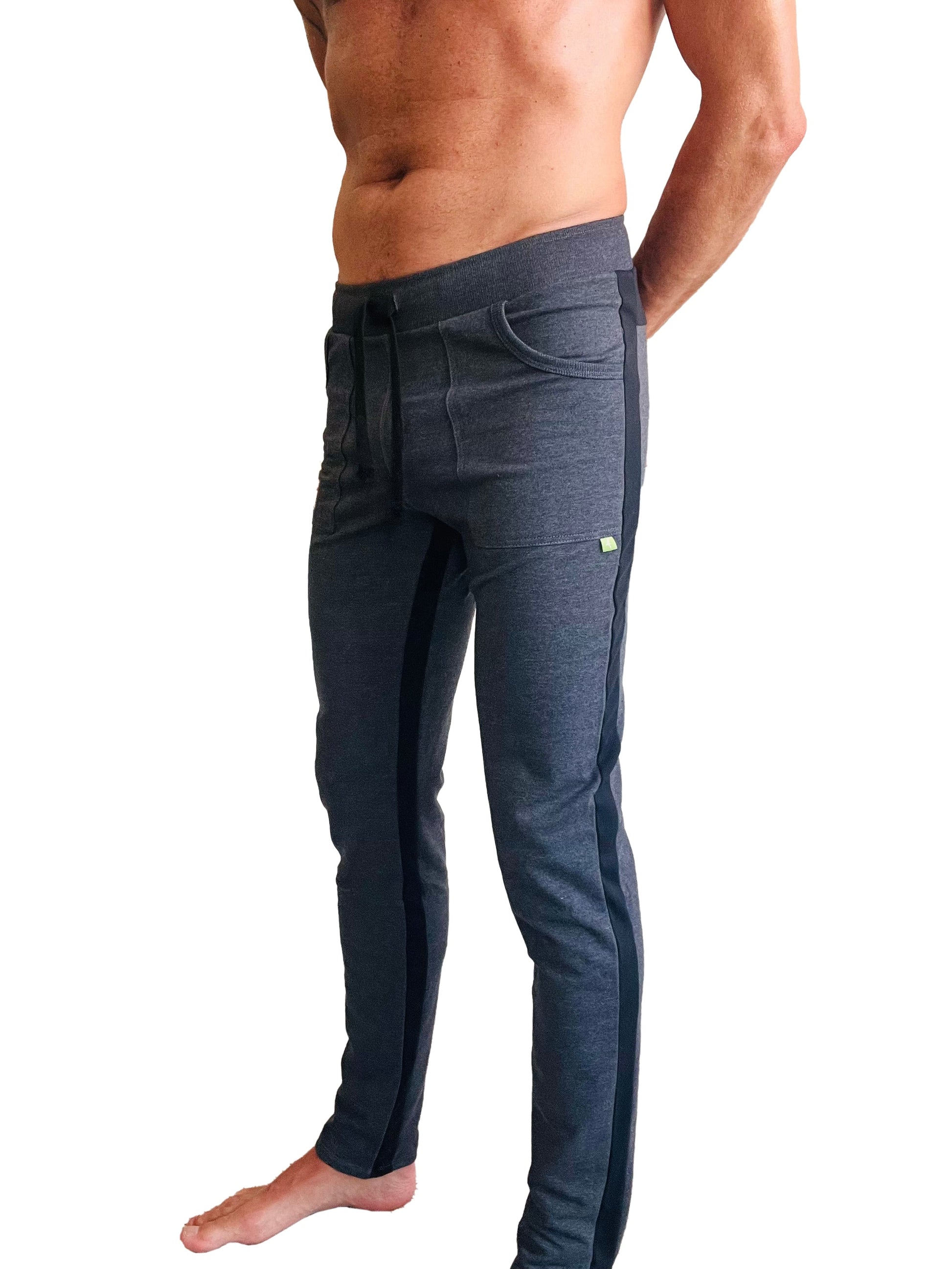 Dark gray heathered eco-track and yoga sweat pant with black side stripes and drawstring waistband in charcoal