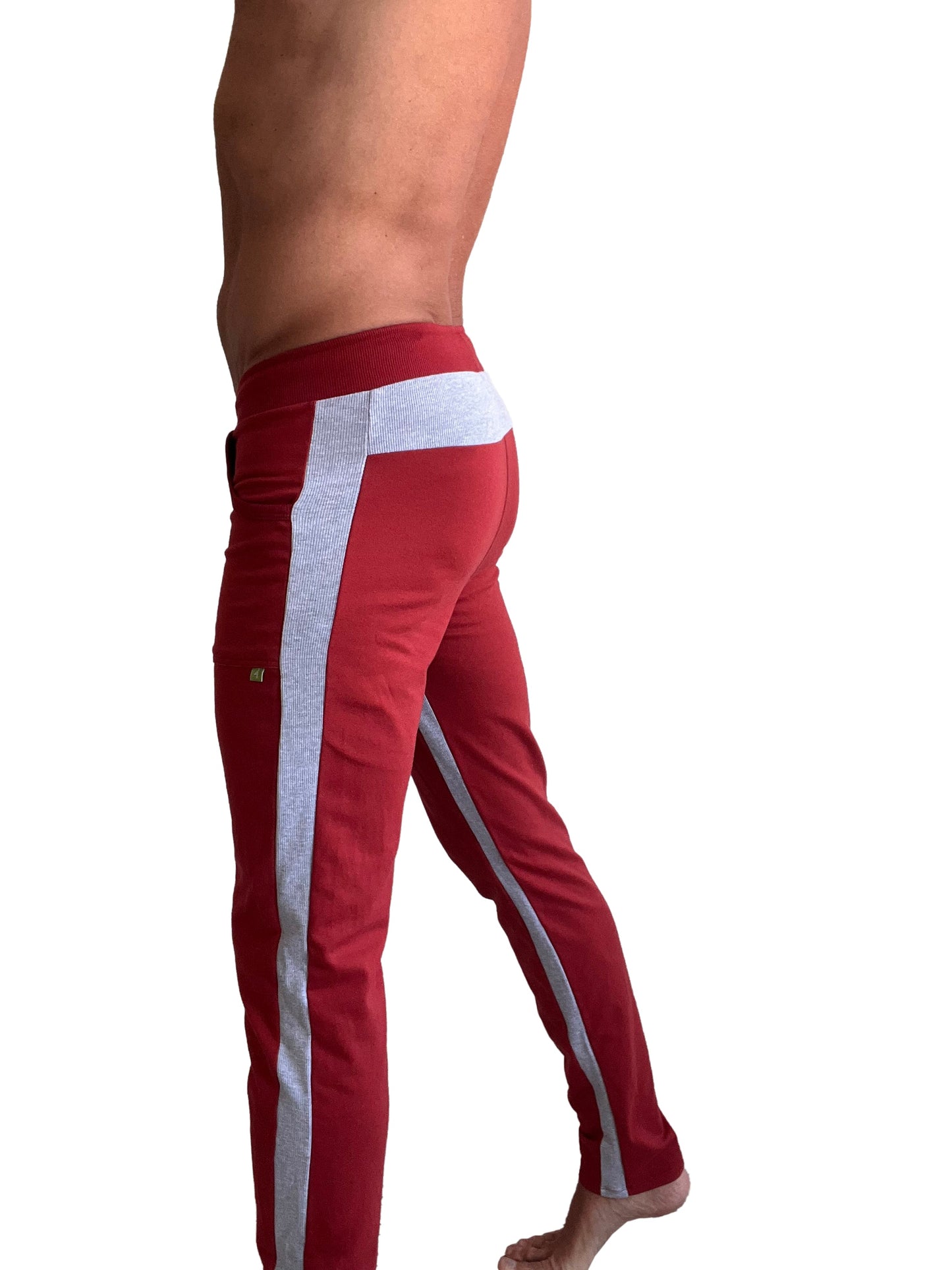 Eco-track & yoga sweat pant in cinnabar red with a textured gray stripe and white waistband panel for athletic wear