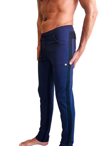 Eco-track and yoga sweat pant in navy blue with black side stripes and a green logo ideal for athletic wear