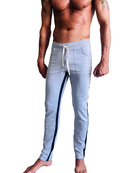 Light gray eco-track and yoga sweat pant with navy blue side stripes and white drawstring waistband