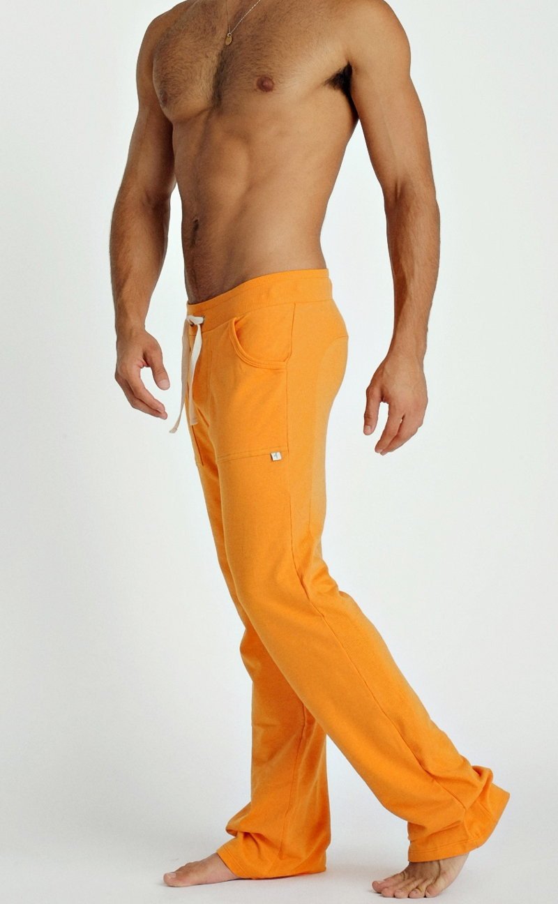 Orange eco-track and yoga sweat pant with white drawstring and side pockets made from eco-friendly material