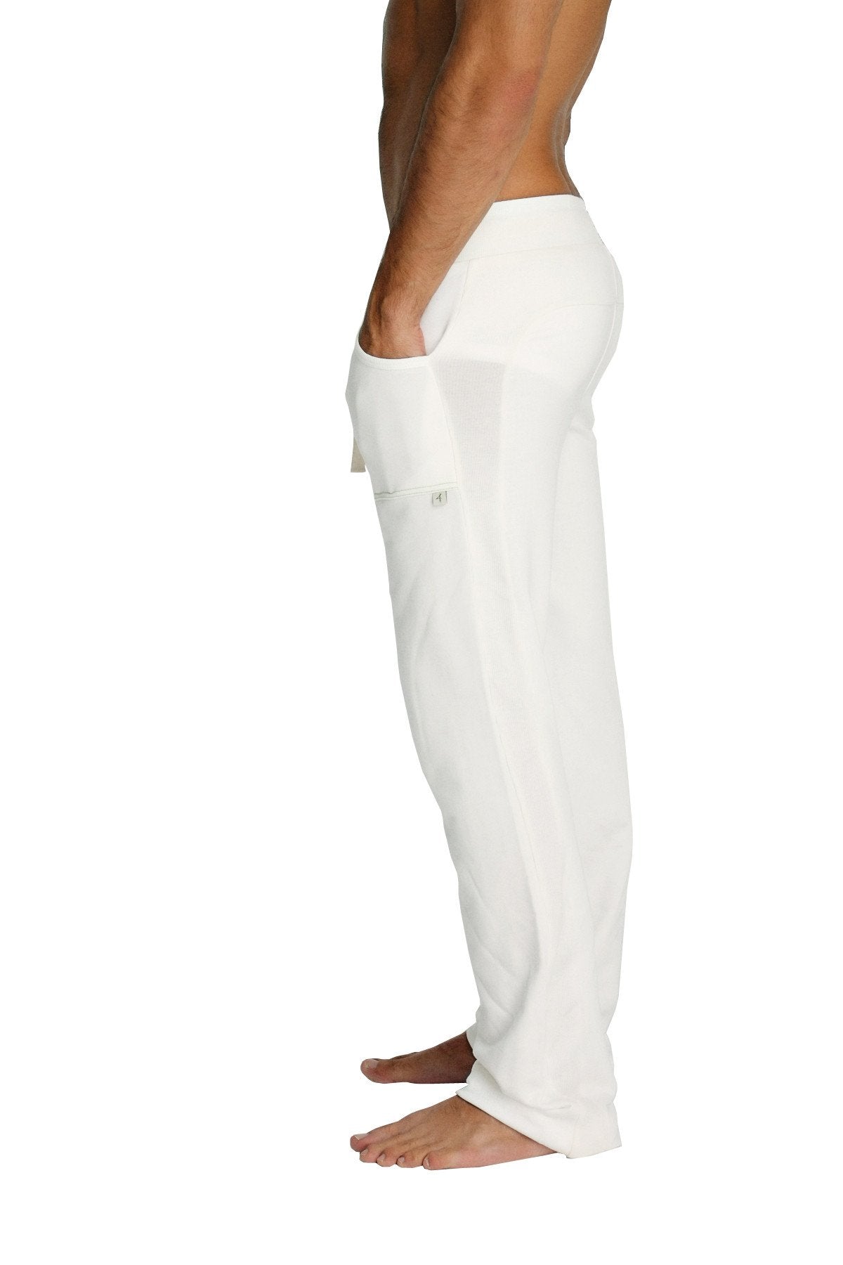 White eco-track and yoga sweat pant with loose fit relaxed style and side pockets for comfortable activewear use
